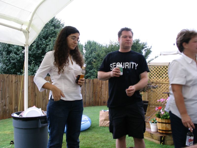 Banu and Doug gaze in disgust at the Coors Light bottle