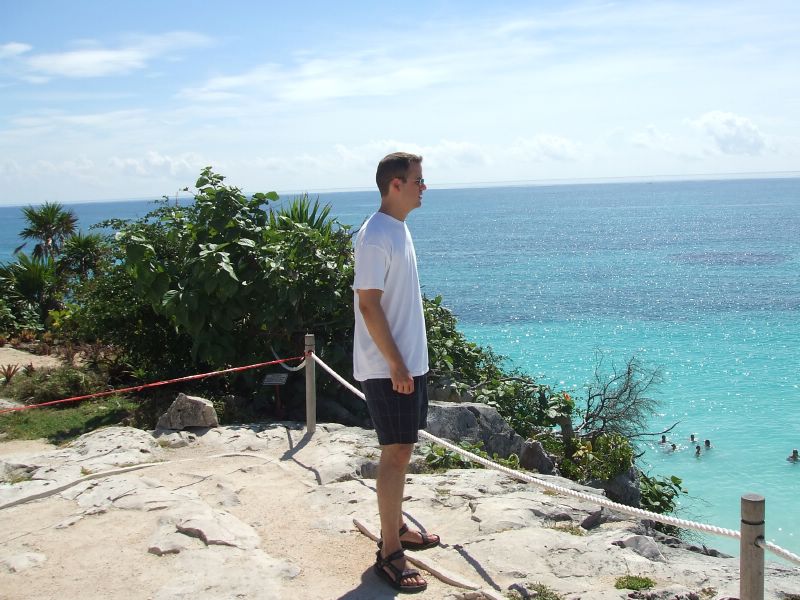 Brian watching people playing in the ocean